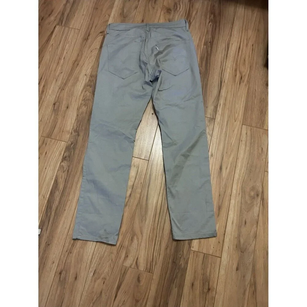 Levi's Jeans Stylish Men’s Beige Colored Rugged Denim Tan Jean Pants Size 30.